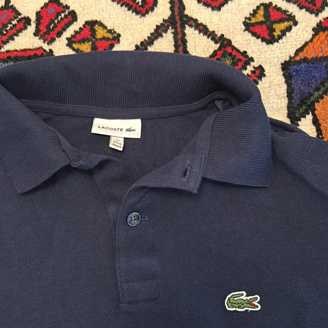 Mörkblå Lacoste piké  - 90