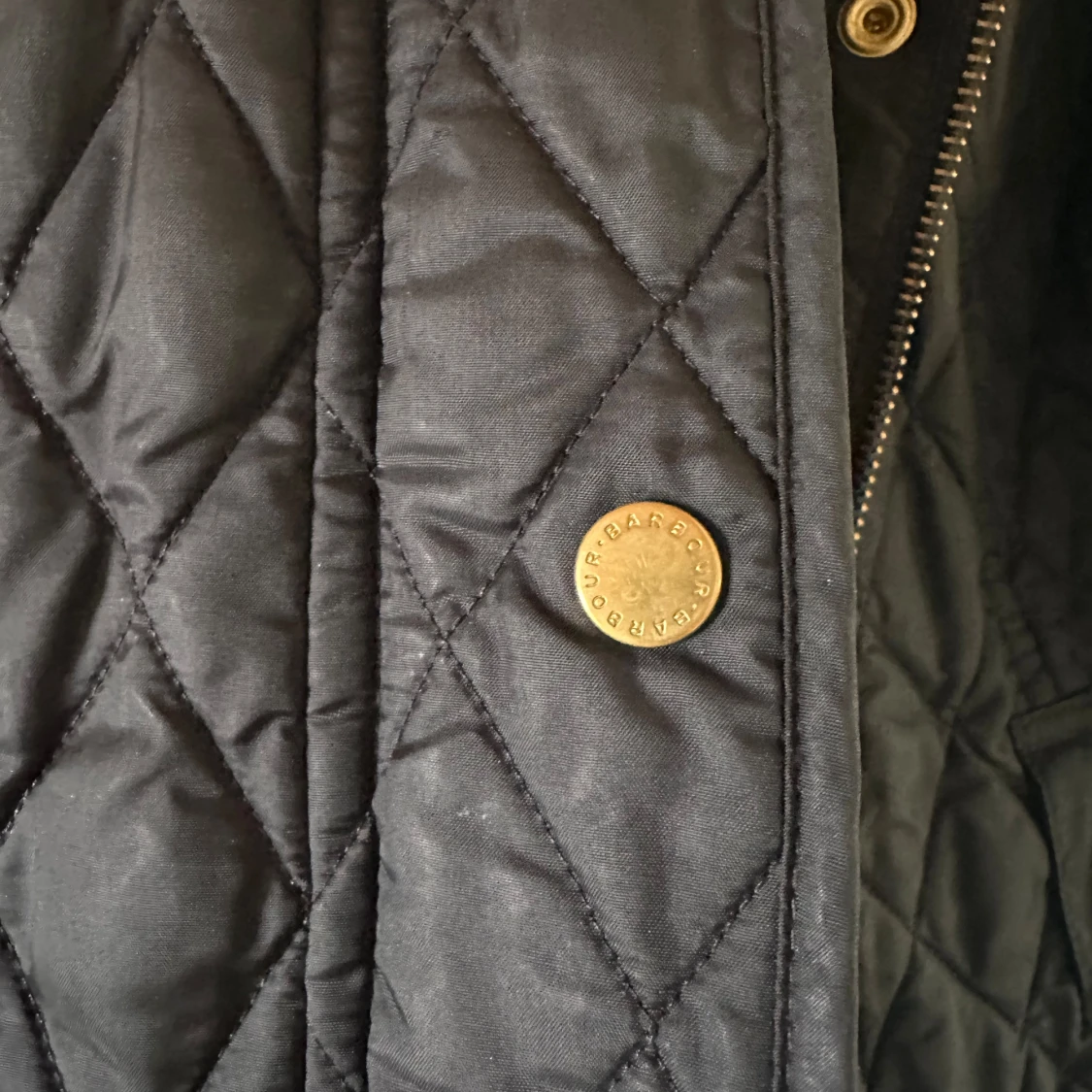 Svart quiltad jacka från Barbour - 91