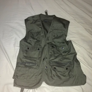 Tactical Vest - Bra skick, använd ett fåtal gånger.