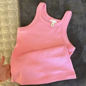 En rosa top från H&M använd 1 gång.