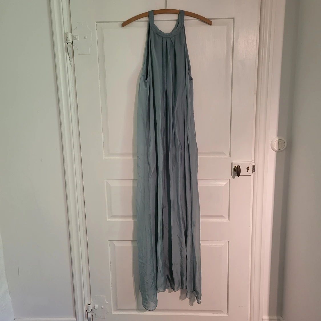 Lång tuskos klänning