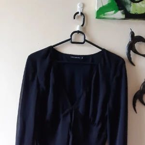 Klänning från Panos Emporio   - Klänning i skir chiffong. Helfodrad. Storlek 42