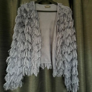 Kofta - En fin kofta i fint skick, använd fåtal gånger.