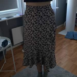 A long skirt with flower patterns