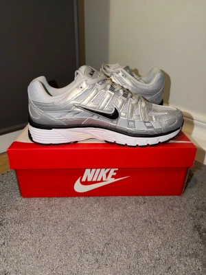 Nike P6000 Silver - New, never worn, with box. I ship the same day as the purchase. Size 40, very comfortable