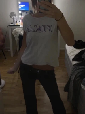 Polo Ralph Lauren - En jätte snygg T-shirt från Ralph Lauren. Storlek är oklart (se sista bilden)