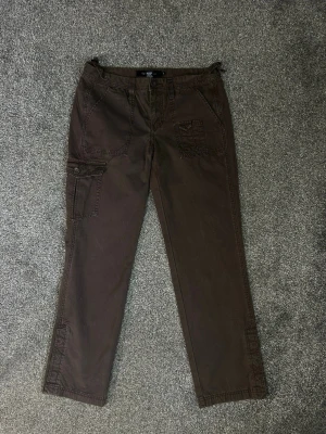 Byxor Calvin Klein Jeans - Byxor Calvin Klein Jeans i brun färg storlek 6, se mått i bilder  A111