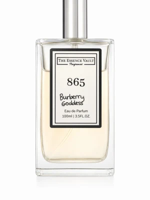 The Essence Vault 865 Burberry Goddess - Elegant parfym i en genomskinlig, rektangulär glasflaska med metallfärgad spraykork. Doften heter 865 Burberry Goddess och flaskan rymmer 100 ml Eau de Parfum. Stilen är stilren och modern med svartvit etikett framtill. Den är testad 