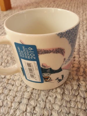 Ny Mumin mugg Djupsnö  - Felfri mugg med etikett kvar. Arabia. Packar mycket bra. 