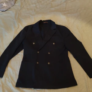 Morris jacka - Morris dubbelbröstad kavaj/sportscoat. Använd 2-3 gånger. Bra skick. Sitter som en medium.