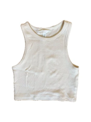 Linne - Krämvitt/svagt butteryellow linne i small. (Utklippningen av bilden ger den konstiga kanter men det ser inte ut så jag lovar)