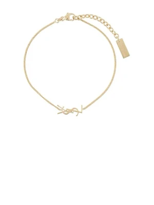 Guldarmband från Yves Saint Laurent - Snyggt och stilrent armband i guld från Yves Saint Laurent med tunn kedja och YSL-logga som detalj. Perfekt accessoar för dig som gillar minimalistisk och lyxig stil. Justerbar längd med liten bricka vid låset.