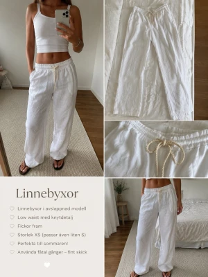 Vita linnebyxor med knyt XS - Snygga vita linnebyxor med låg midja och knytband i midjan. Byxorna har fickor fram och är perfekta för varma dagar. Passar dig som gillar en chill och stilren look. Likt de populära Roxy linnebyxorna!