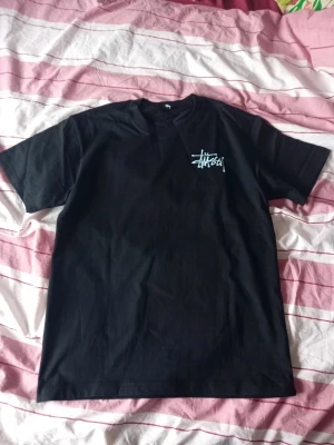 Black Stussy Dice Tee - Almost new without tags, barely any flaws, size M | Dimensions: Length - 67 cm / Width - 46 cm |  For more information, please send me a private message.