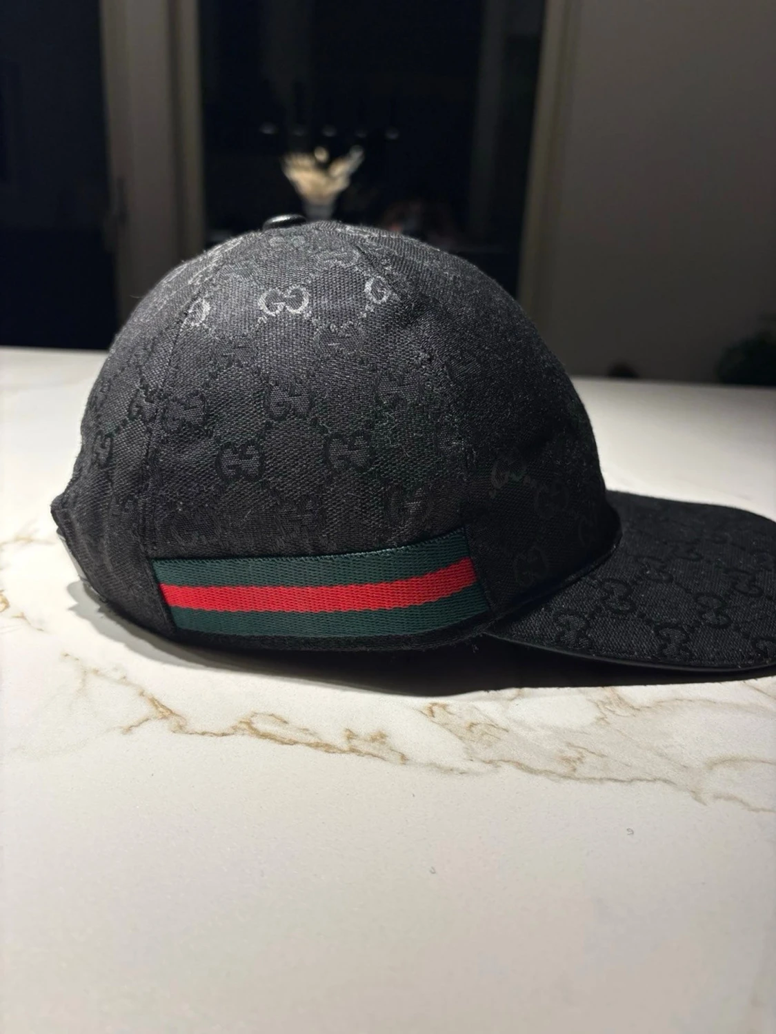 Svart keps från Gucci med GG-mönster - 1