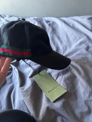 Svart keps  - Snygg svart keps ny skick.