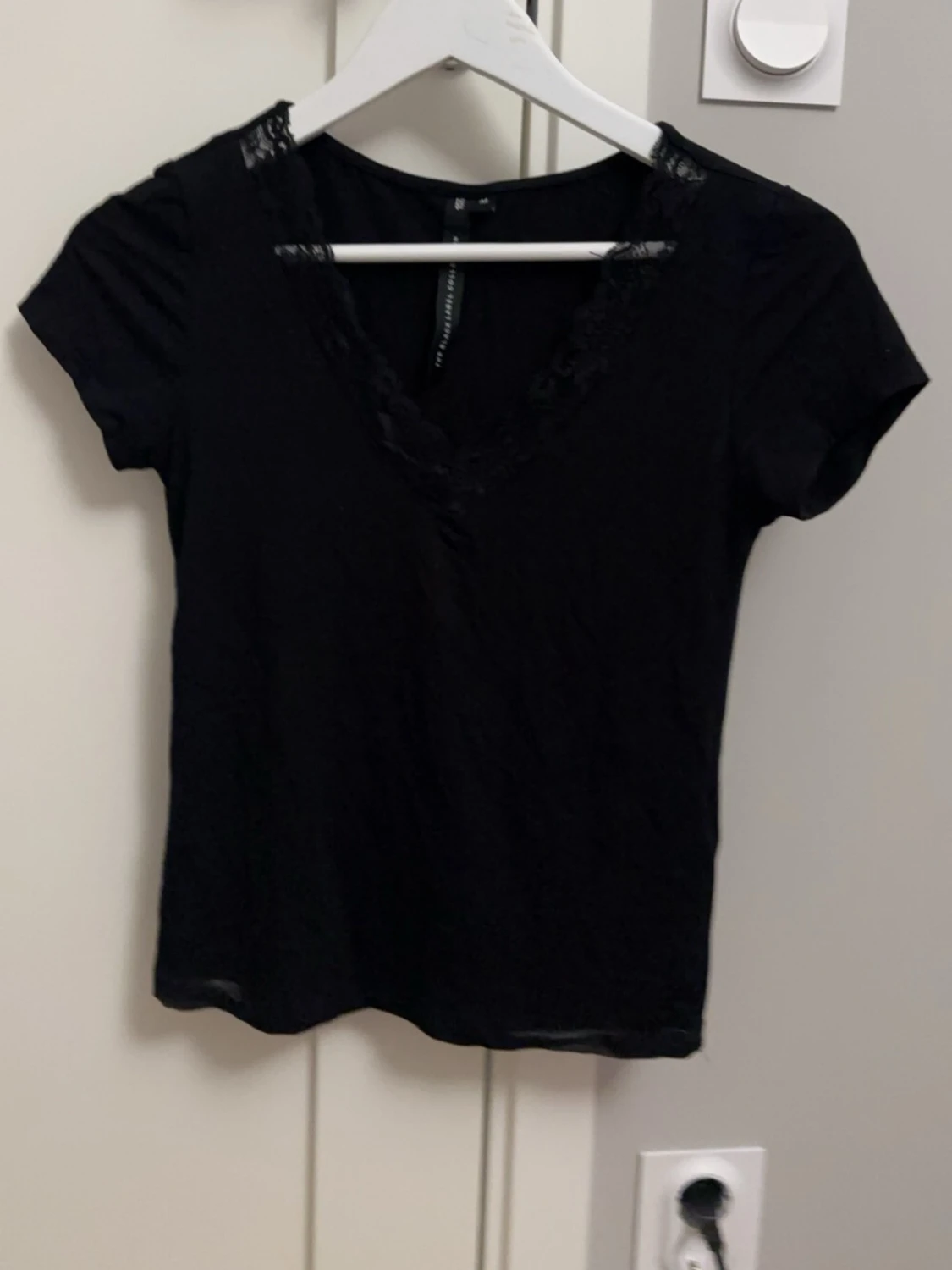 Svart topp med spets från H&M