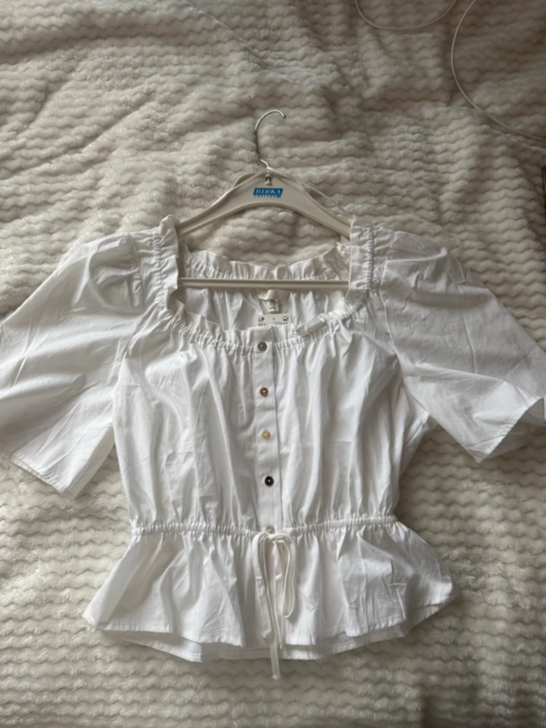 Vit blus