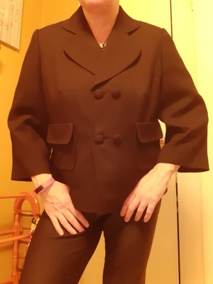 Black blazer from  Next - Lovely office blazer with a bit of twist... Nice in and out. Lovely details. Very good, lightweight material and excellent quality as expected from Next. Size 16/44/XL