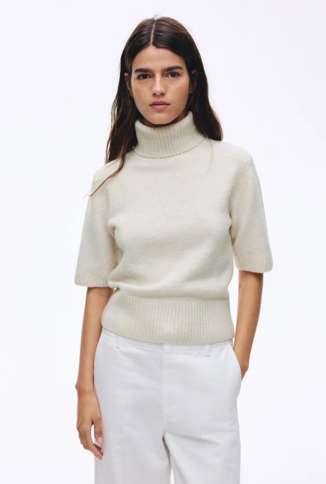 Beige polotröja i ullmix med kort ärm