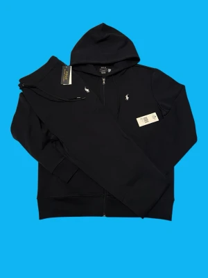 Ralph Lauren Tracksuit Size Large (Black) - Brand: Ralph Lauren Condition: Brand new  Color: Black Size: Large Measurements: Pants length 104cm waist 40-50 Zip hoodie length 68cm shoulder 48cm  • Message for questions or offers  • Cheaper if you buy more items • Delivery within 24hrs