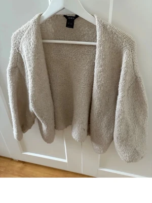 Beige stickad kofta från Lindex - Storlek xs/s 
