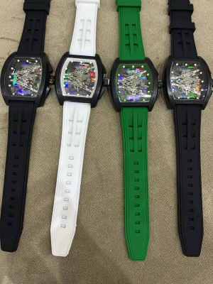 RICHARD MILLION - Säljer en richard million  klocka med transparent urtavla och färgglada detaljer. Finns med svart, vit eller grön silikonarmband. Klockan har en unik formad boett och synliga mekaniska delar som ger en cool och futuristisk känsla. HELT NY
