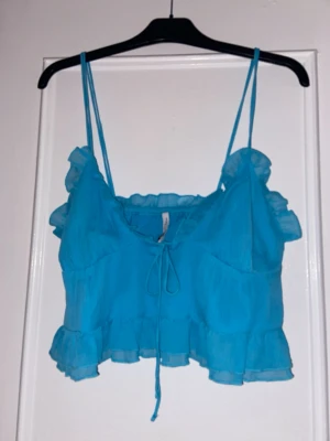 Fin blå topp / linne - Aldrig använd - passar typ S-L