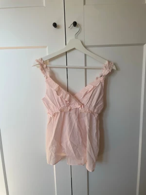 Rosa blus - Säljer en jätte fin rosa blus ifrån kidsbrandstore i storlek 170💕