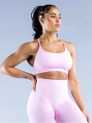 Dfyne Dynamic Backless Sports Bra  - Säljer ett Dfyne Dynamic Backless Sports Bra i färgen light rosé Pink. Perfekt för gymmet. Materialet är stretchigt.