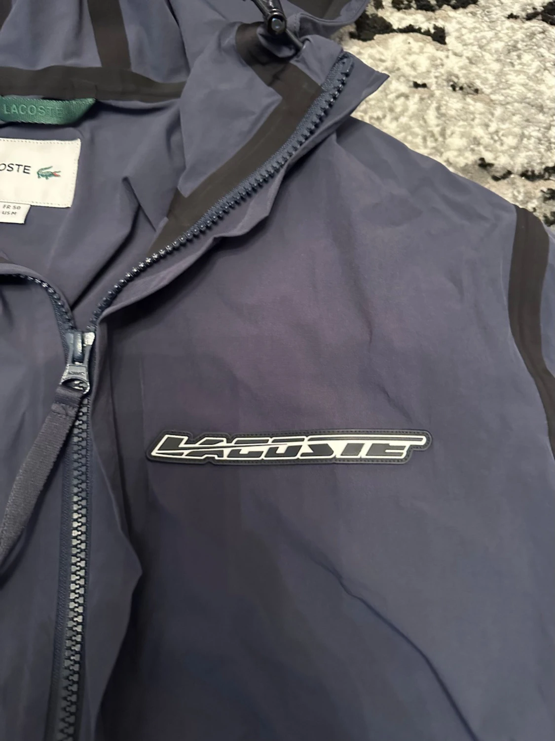 Mörkblå vindjacka från Lacoste - 1