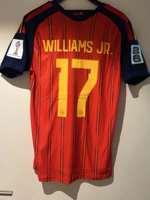 Spanien Vm 2026 Williams JR  - En Spanien Vm tröja 2026 med Williams JR Spelar Version, Storlek L helt ny 