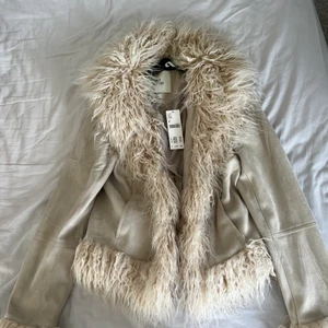 Afghan / penny lane jacka NY - Aldrig använd afghan/penny land jacka från Urban outfitters. Nypris 900kr. Pris kan diskuteras. 