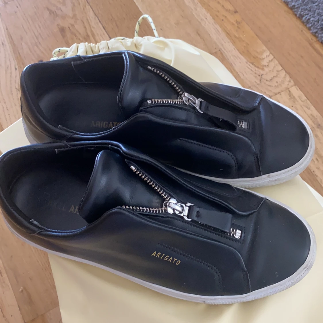 Axel arigato skor