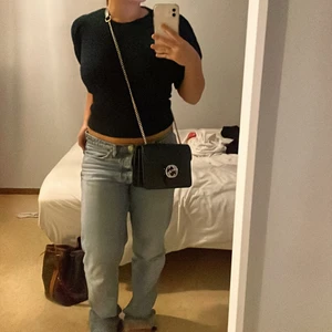 Svart stickad T-Shirt - Stickad T-Shirt från vero Moda i storlek XS, använd enstaka gånger