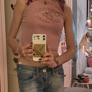 Söt topp - Söt topp! I barnstorlek och storleken står inte i men funkar på xxs-s!