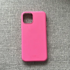 Mobilskal  - ett iPhone 11 PRO holditskal i ett super skick, älskar det