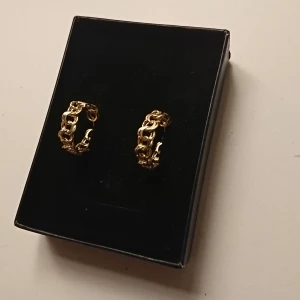 Bismarck 18K - Ör ringar i bismarck