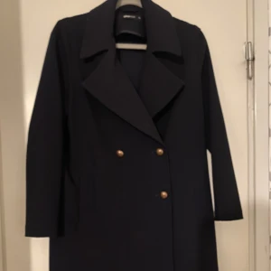 Fin mellanång kappa - Fin kappa. Använd några få gånger.