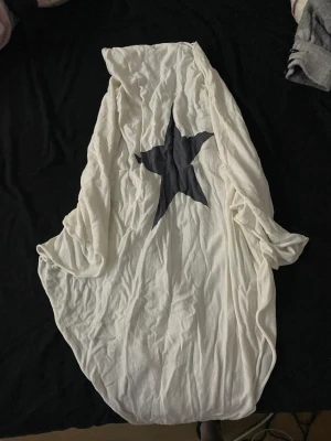 Poncho - En tunnare poncho Knappt använd