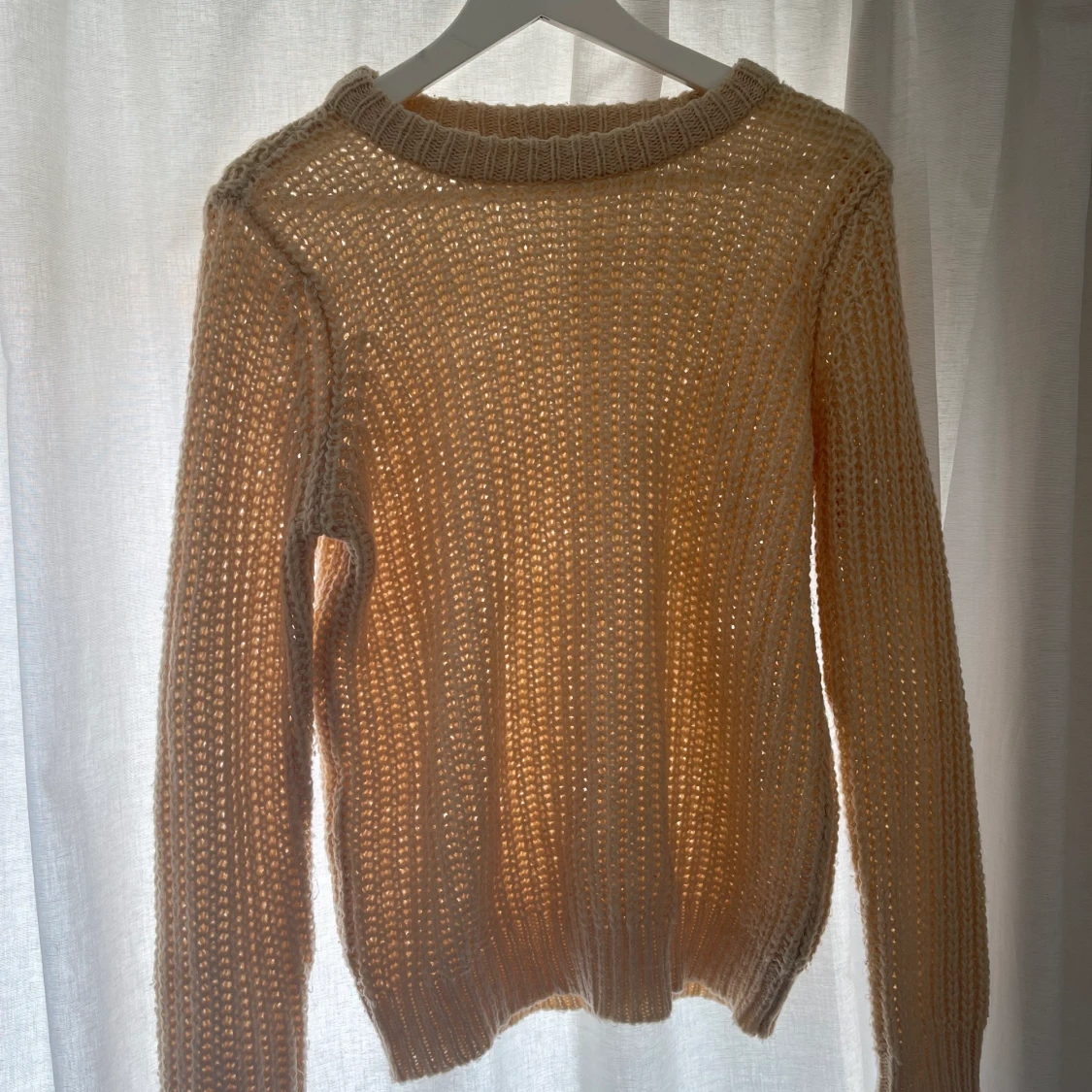 Ljusrosa stickad tröja