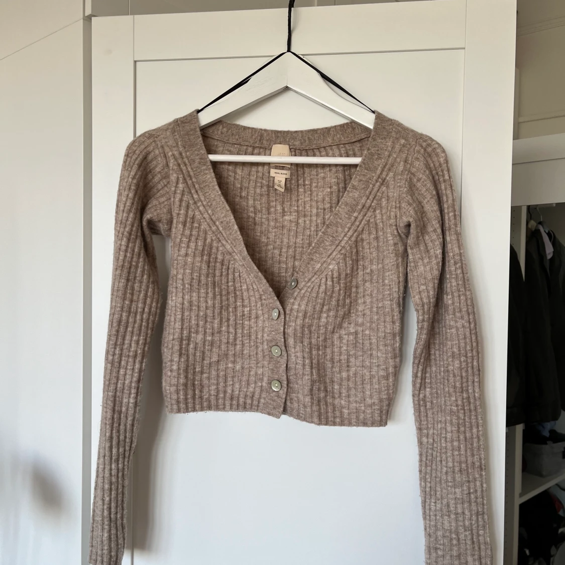 Kort beige ullkofta - 90