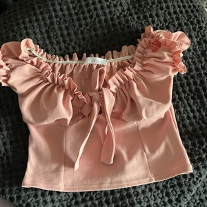 Rosa topp  - Strl s vet ej vart den är köpt 