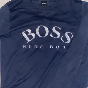 Hugo Boss tröja, Storlek XS i man.