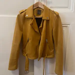 Biker jacket in yellow suede with belt and zip details. Perfect condition. EU size 38/UK size 10