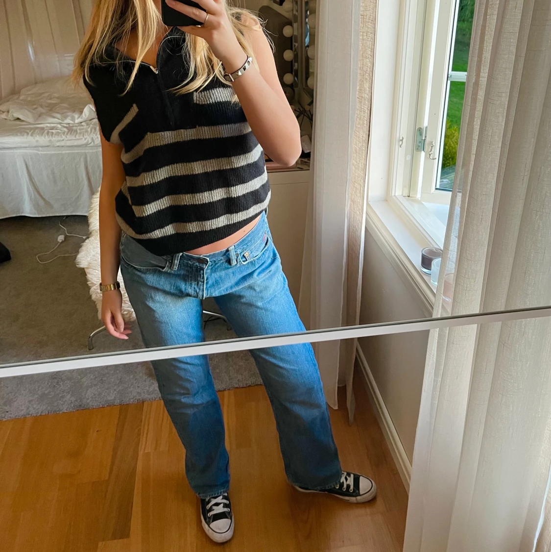 Stickad väst med dragkedja