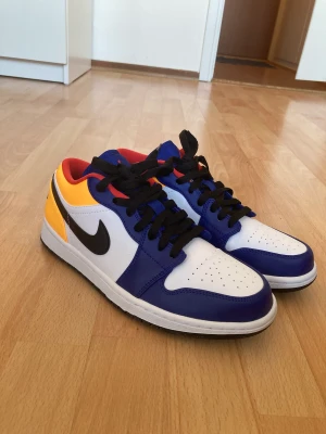 Nike Air Jordan 1 Low yellow blue red size 40,5 - Great condition. Only worn twice. Unfortunately no box with :(
