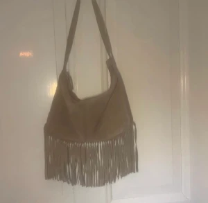 Topshop Axelväska  - En unik och fin axelväska från topshop.