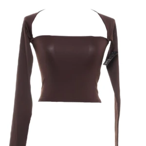 Topp, Nelly - Helt ny, endast testad!! Brun topp i storlek XS, tyvärr lite för liten på mig 