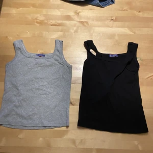 Två par linnen - Två par linnen i färgen grå och svart.  Inte använt så ofta 